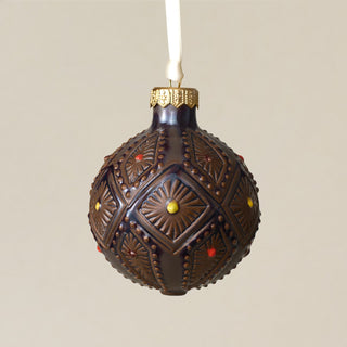 Intricately carved and glazed ceramic globe ornament with ivory satin ribbon – Ornament No. 332