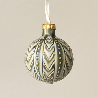 Intricately carved and glazed ceramic globe ornament with ivory satin ribbon – Ornament No. 335