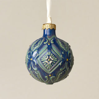 Intricately carved and glazed ceramic globe ornament with ivory satin ribbon – Ornament No. 336