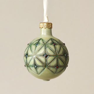 Intricately carved and glazed ceramic globe ornament with ivory satin ribbon – Ornament No. 343