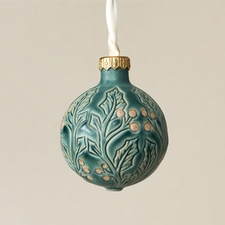 Intricately carved and glazed ceramic globe ornament with ivory satin ribbon – Ornament No. 346
