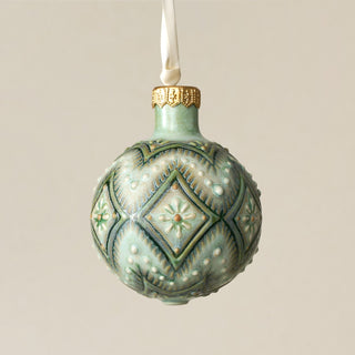Intricately carved and glazed ceramic globe ornament with ivory satin ribbon – Ornament No. 347