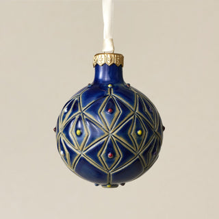 Intricately carved and glazed ceramic globe ornament with ivory satin ribbon – Ornament No. 348