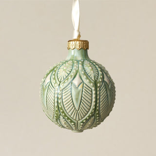 Intricately carved and glazed ceramic globe ornament with ivory satin ribbon – Ornament No. 349