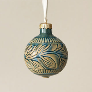 Intricately carved and glazed ceramic globe ornament with ivory satin ribbon – Ornament No. 354