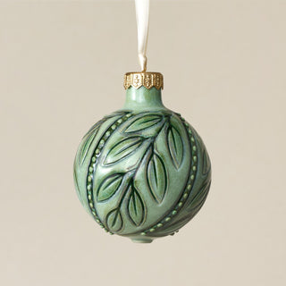 Intricately carved and glazed ceramic globe ornament with ivory satin ribbon – Ornament No. 357