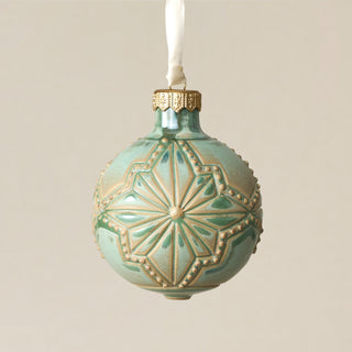 Intricately carved and glazed ceramic globe ornament with ivory satin ribbon – Ornament No. 361