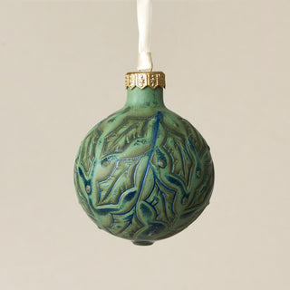 Intricately carved and glazed ceramic globe ornament with ivory satin ribbon – Ornament No. 364