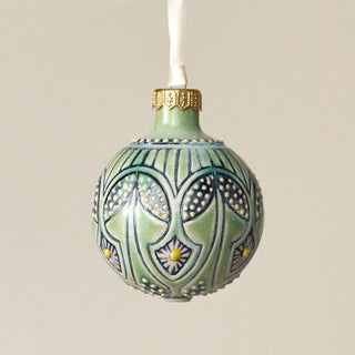 Intricately carved and glazed ceramic globe ornament with ivory satin ribbon – Ornament No. 370