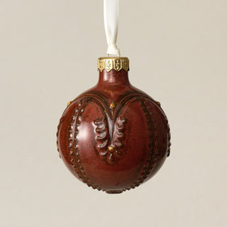Intricately carved and glazed ceramic globe ornament with ivory satin ribbon – Ornament No. 373