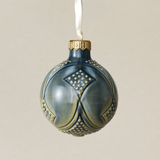 Intricately carved and glazed ceramic globe ornament with ivory satin ribbon – Ornament No. 383