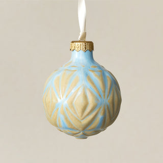 Intricately carved and glazed ceramic globe ornament with ivory satin ribbon – Ornament No. 384