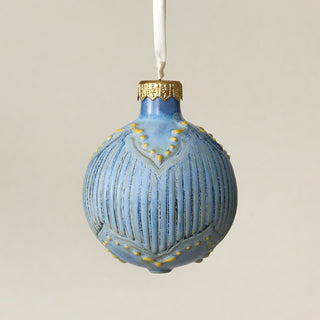 Intricately carved and glazed ceramic globe ornament with ivory satin ribbon – Ornament No. 385