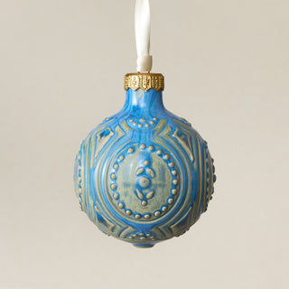 Intricately carved and glazed ceramic globe ornament with ivory satin ribbon – Ornament No. 386