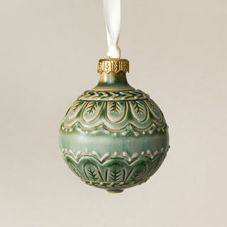 Intricately carved and glazed ceramic globe ornament with ivory satin ribbon – Ornament No. 387