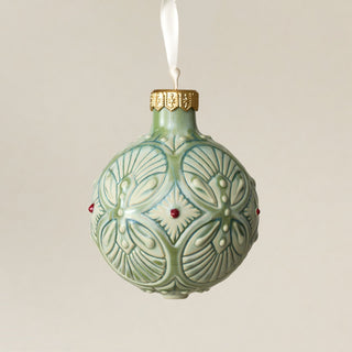 Intricately carved and glazed ceramic globe ornament with ivory satin ribbon – Ornament No. 390