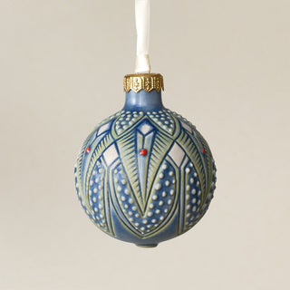 Intricately carved and glazed ceramic globe ornament with ivory satin ribbon – Ornament No. 391
