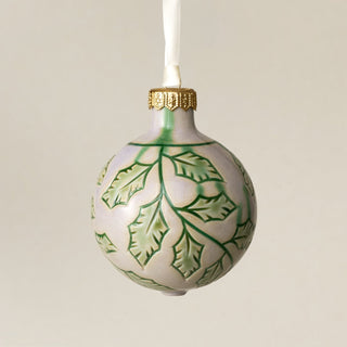 Intricately carved and glazed ceramic globe ornament with ivory satin ribbon – Ornament No. 392