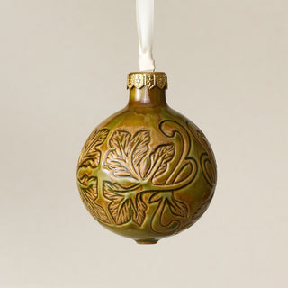 Intricately carved and glazed ceramic globe ornament with ivory satin ribbon – Ornament No. 396