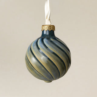 Intricately carved and glazed ceramic globe ornament with ivory satin ribbon – Ornament No. 398