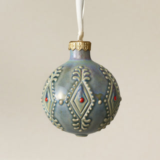Intricately carved and glazed ceramic globe ornament with ivory satin ribbon – Ornament No. 403