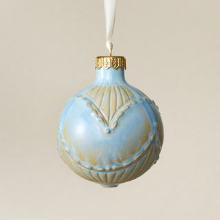 Intricately carved and glazed ceramic globe ornament with ivory satin ribbon – Ornament No. 406