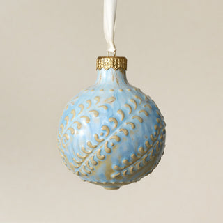 Intricately carved and glazed ceramic globe ornament with ivory satin ribbon – Ornament No. 407