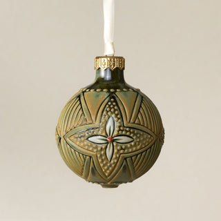 Intricately carved and glazed ceramic globe ornament with ivory satin ribbon – Ornament No. 410