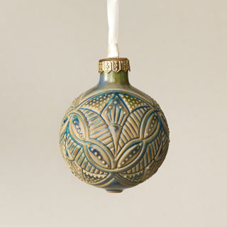 Intricately carved and glazed ceramic globe ornament with ivory satin ribbon – Ornament No. 411