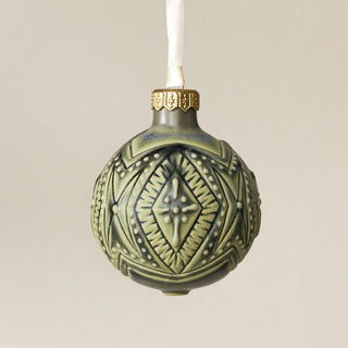 Intricately carved and glazed ceramic globe ornament with ivory satin ribbon – Ornament No. 416