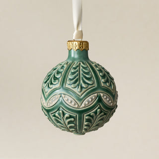 Intricately carved and glazed ceramic globe ornament with ivory satin ribbon – Ornament No. 421