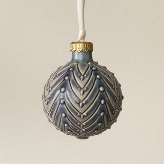 Intricately carved and glazed ceramic globe ornament with ivory satin ribbon – Ornament No. 425
