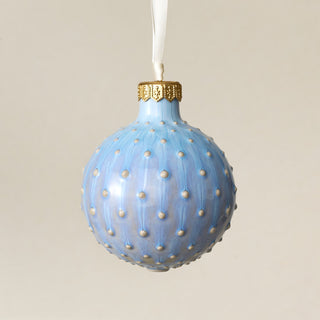 Intricately carved and glazed ceramic globe ornament with ivory satin ribbon – Ornament No. 427