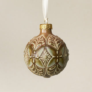 Intricately carved and glazed ceramic globe ornament with ivory satin ribbon – Ornament No. 428