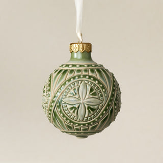 Intricately carved and glazed ceramic globe ornament with ivory satin ribbon – Ornament No. 430