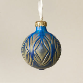 Intricately carved and glazed ceramic globe ornament with ivory satin ribbon – Ornament No. 433