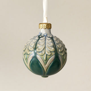 Intricately carved and glazed ceramic globe ornament with ivory satin ribbon – Ornament No. 434