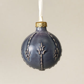 Intricately carved and glazed ceramic globe ornament with ivory satin ribbon – Ornament No. 435