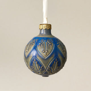 Intricately carved and glazed ceramic globe ornament with ivory satin ribbon – Ornament No. 436