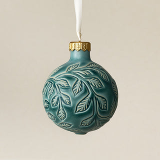 Intricately carved and glazed ceramic globe ornament with ivory satin ribbon – Ornament No. 438