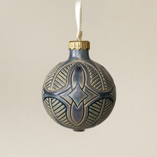 Intricately carved and glazed ceramic globe ornament with ivory satin ribbon – Ornament No. 439