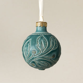 Intricately carved and glazed ceramic globe ornament with ivory satin ribbon – Ornament No. 444