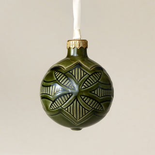 Intricately carved and glazed ceramic globe ornament with ivory satin ribbon – Ornament No. 445