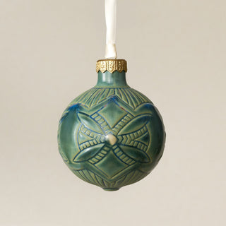 Intricately carved and glazed ceramic globe ornament with ivory satin ribbon – Ornament No. 452