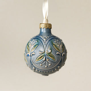 Intricately carved and glazed ceramic globe ornament with ivory satin ribbon – Ornament No. 454