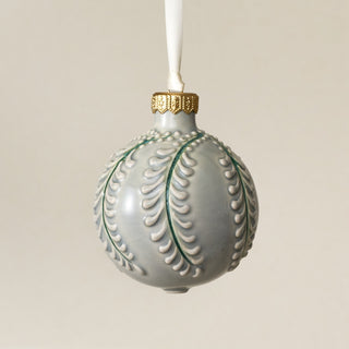 Intricately carved and glazed ceramic globe ornament with ivory satin ribbon – Ornament No. 456