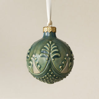 Intricately carved and glazed ceramic globe ornament with ivory satin ribbon – Ornament No. 457