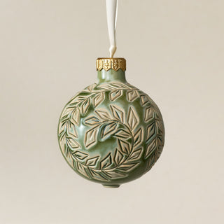 Intricately carved and glazed ceramic globe ornament with ivory satin ribbon – Ornament No. 458