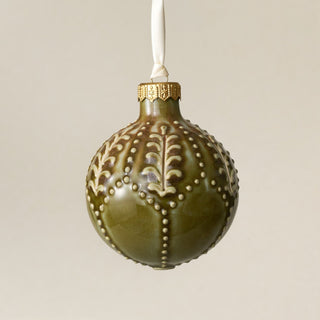 Intricately carved and glazed ceramic globe ornament with ivory satin ribbon – Ornament No. 460