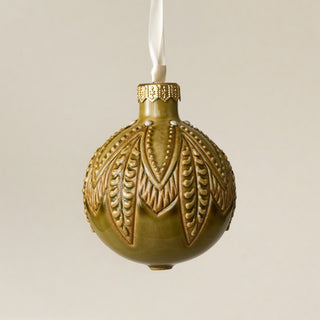 Intricately carved and glazed ceramic globe ornament with ivory satin ribbon – Ornament No. 463